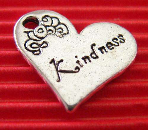 21mm Shiny Silver Solid Heart Charm inscribed with the word "Kindness"