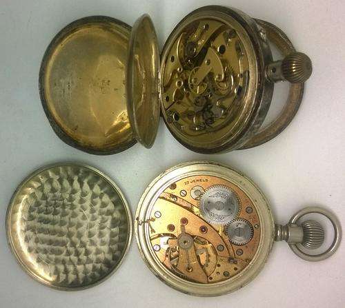 Stunning Pocket watch give away!!!! look at the pictures one 17 jewels and a Silver 935 ,, for parts