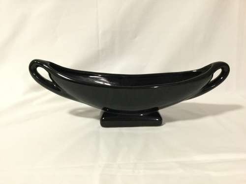 Black Vase with Yellow Shoes