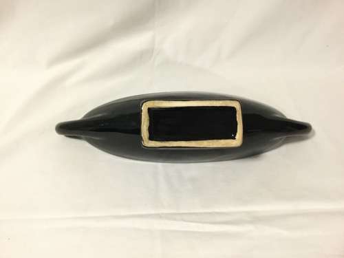 Black Vase with Yellow Shoes