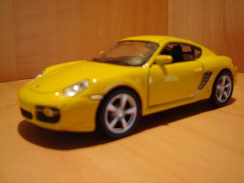 Stunning Porsche  Cayman S  by  WELLY FX  New in Display Box - Garenteed