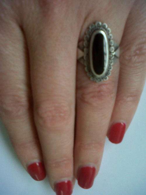 Beautiful silver ring with enamel inlay.