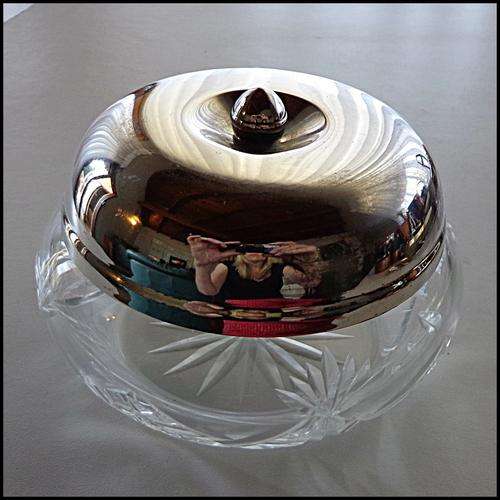 Crystal Bowl Silverplated lid.                                 Tiniest chip under the lid.