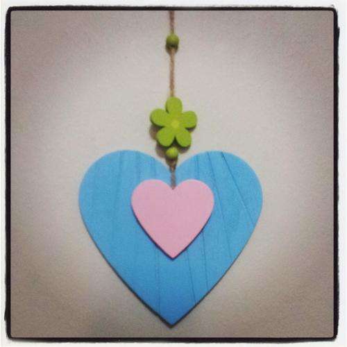 Hand painted wood heart wall hanging. Perfect for a little girls room.