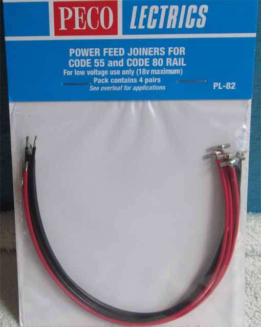 PECO N SCALE - PL-82 POWER FEED JOINERS -  NEW CARDED, CONTAINS 4 PRS.