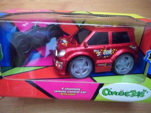CUTE 4 CHANNEL REMOTE CONTROL CAR WITH LIGHT! GREAT FUN FOR ALL.