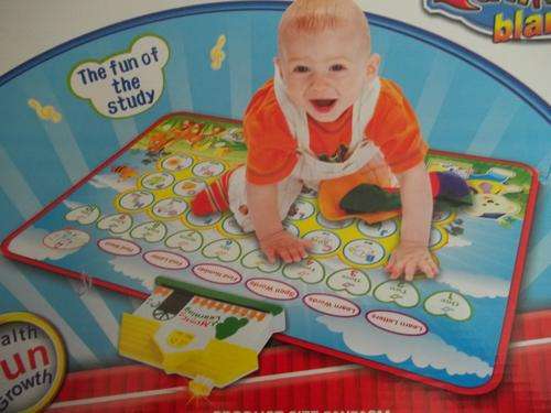 Baby Interative Learning musical BLANKET. Extra soft. Great stimulation and fun for Baby!