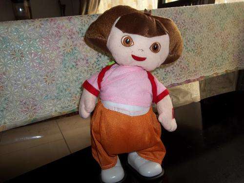 **LAST ONE**Singing ,dancing , walking DORA doll. Very adorable. Kids will love it!