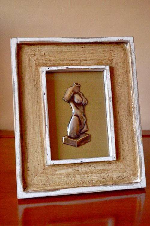Pewter Body Art on Distressed Wooden Frame
