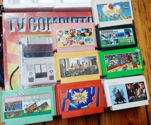 VINTAGE TV GAME INCLUDES CARTRIDGES