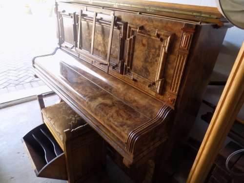 A BEAUTIFUL WALNUT HUNT PIANO MADE IN LONDON