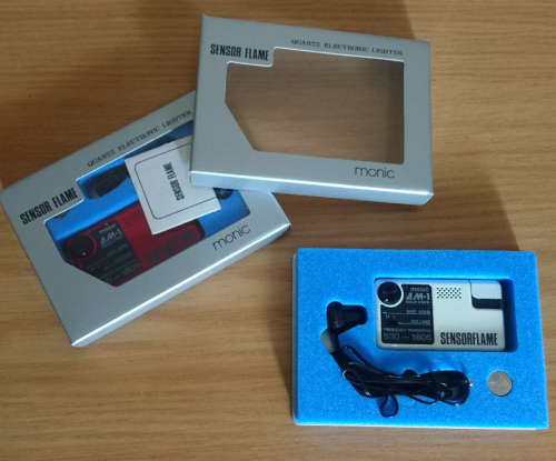 Monic Quartz Electronic Lighter with FM Radio (Sensor Flame) 1 Blue, 1 White Available
