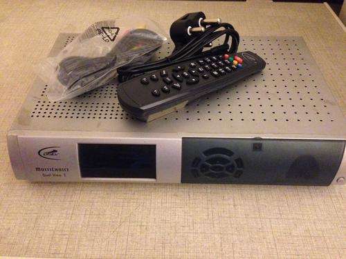 A DSTV DUAL-VIEW DECODER + REMOTE AND CABLES
