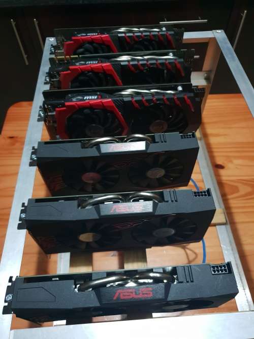 6 x unidentified MSI and ASUS graphic cards ( GPU MINER )