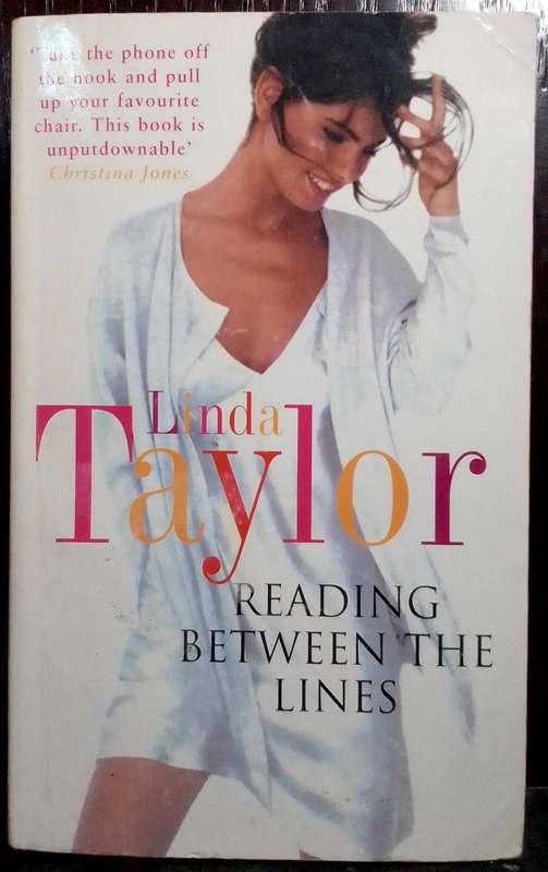 Reading Between the Lines - Linda Taylor
