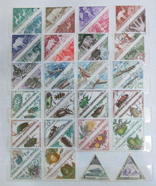Collection of triangular stamps plus album