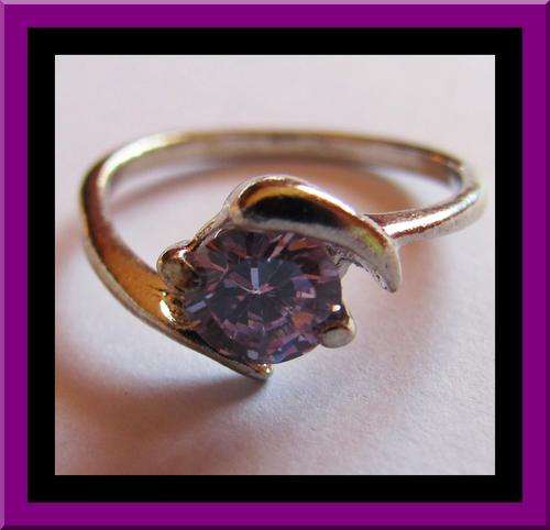 STYLISH!!! ELEGANT SIMULATED TOPAZ SET IN LOVELY WHITE GOLD PLATED RING SIZE 7