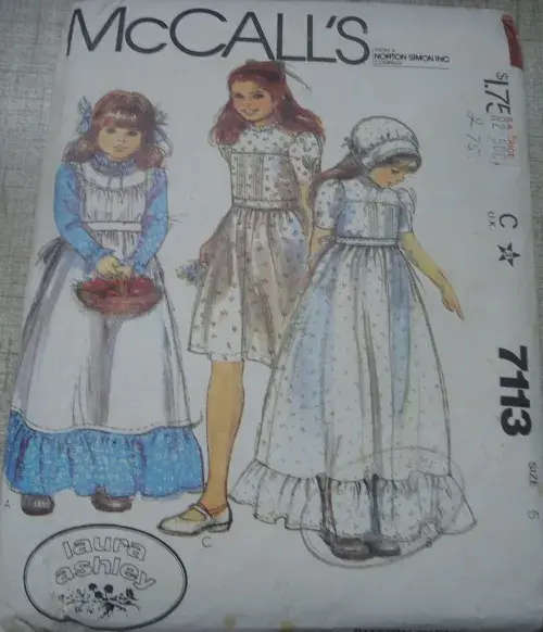 McCALL`S PATTERNS 7113 LAURA ASHLEY GIRLS DRESS, APRON, & BONNET SIZE 6 YEARS COMPLETE