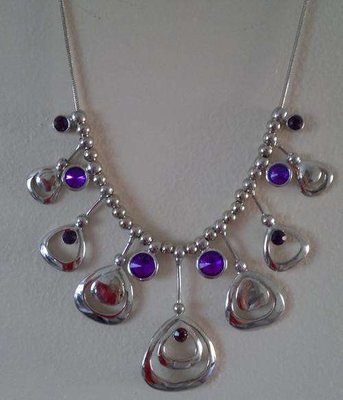 Gorgeous silver necklace with purple stone