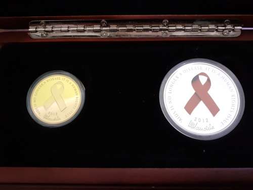 Mandela Red Ribbon Twinset 2012 1/2 ounce gold coin , 1 ounce silver coin. Norway Mint only 2500.