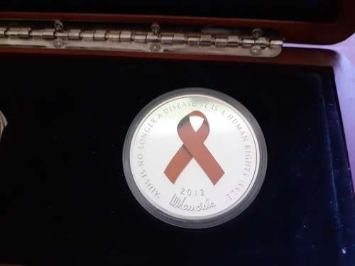 Mandela Red Ribbon Twinset 2012 1/2 ounce gold coin , 1 ounce silver coin. Norway Mint only 2500.