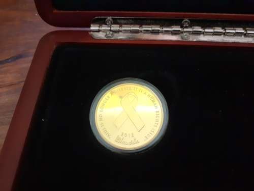 Mandela Red Ribbon Twinset 2012 1/2 ounce gold coin , 1 ounce silver coin. Norway Mint only 2500.
