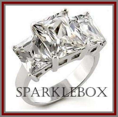 ~PRINCESS CUT  SIMULATED DIAMOND BAND RING SIZE 7***~