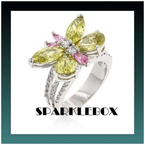 **WHITE GOLD RHODIUM PLATED PINK PERIDOT BUTTERFLY RING**SIZE 7