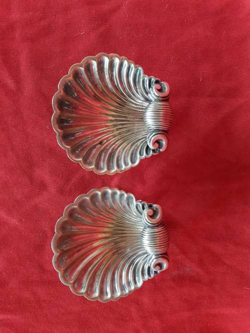 A beautiful pair of EPNS shell shaped holders