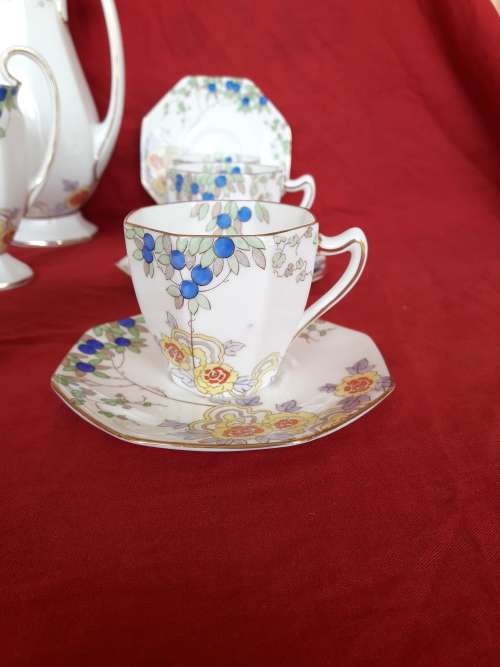 A beautiful floral Royal Doulton coffee set
