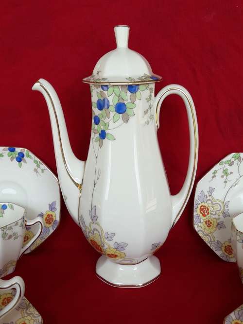 A beautiful floral Royal Doulton coffee set