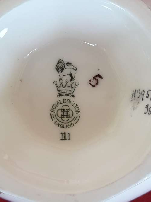 A beautiful floral Royal Doulton coffee set