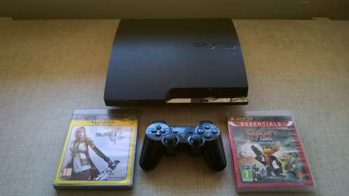 250 gb Ps3 slim with 2 games and 2 controllers