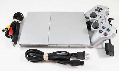 PS2+2 SONY REMOTES, STEERING WHEEL AND PEDALS+ APPROX 10 GAMES.