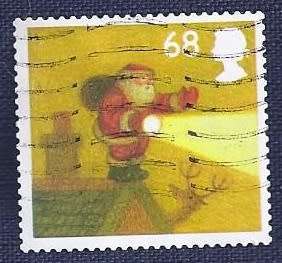 Britain.2004Christmas     68P   On Edge of Roof with Torch