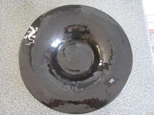 Stunning solid glass bowl with steel effect lizard