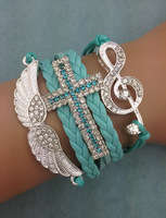 **Discounted Shipping** Infinity Bracelet blue glitter cross wings