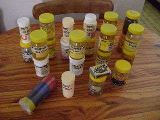 Assortment of Plastic Bottles containing Screws,Fasteners,etc
