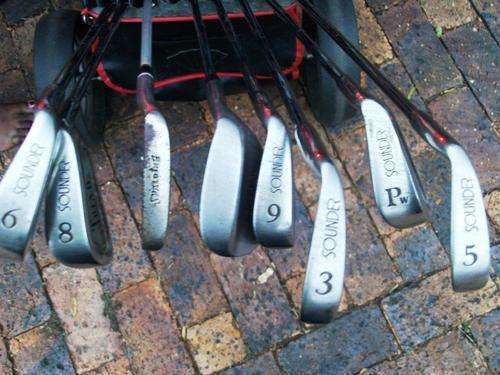 Golf Clubs and Trolley