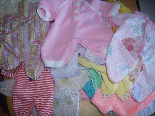 Selection of beautiful dolls clothes all sizes