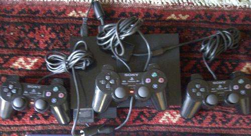 PS 2 Slim Console with three controllers, 12 games & Memory module