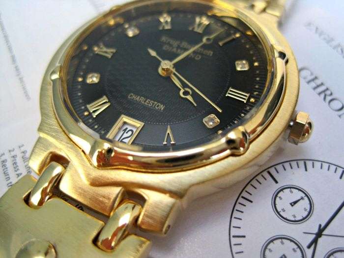 Retail: R10,714.00** Krug-Baumen MEN Charleston 4 Diamond Black Dial Gold Strap Watch
