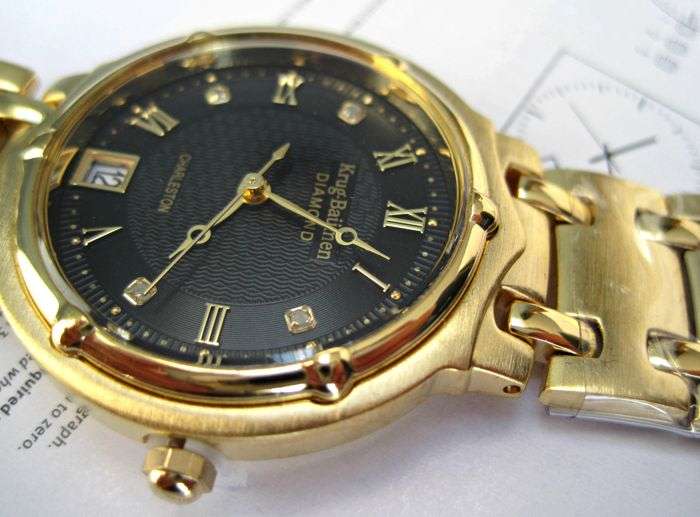 Retail: R10,714.00** Krug-Baumen MEN Charleston 4 Diamond Black Dial Gold Strap Watch