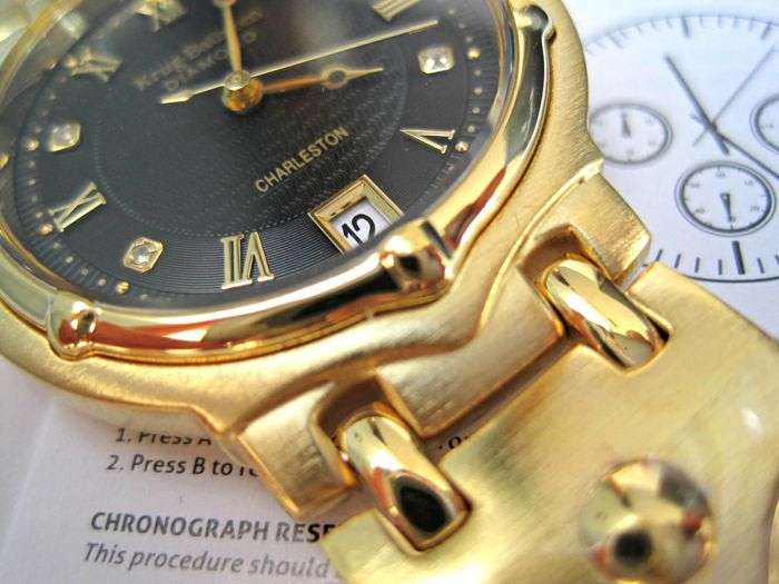 Retail: R10,714.00** Krug-Baumen MEN Charleston 4 Diamond Black Dial Gold Strap Watch