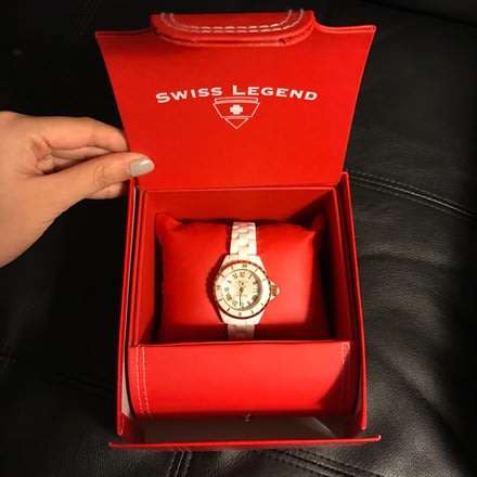 Retail: R8,830.00 Swiss Legend Women's 23K Gold PL Karamica Analog Display Swiss Quartz White Watch