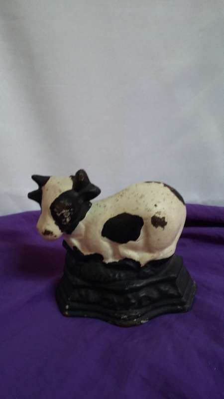 VINTAGE CAST IRON DOOR STOPPER