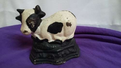 VINTAGE CAST IRON DOOR STOPPER