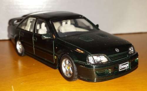 Opel Lotus Omega 1989 black-met 1/43 IXO NEW+showcased  #4518 instant wheels