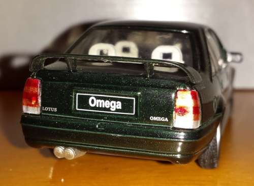 Opel Lotus Omega 1989 black-met 1/43 IXO NEW+showcased  #4518 instant wheels