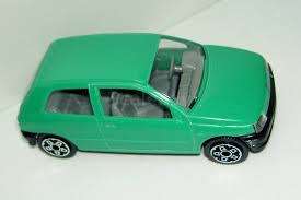 Renault Clio  green-met 1/43 Bburago NEW+showcased  #5090 instant wheels